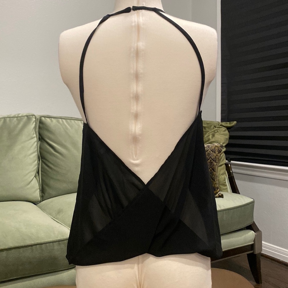 See through back low cut back with beautiful stitching in the front